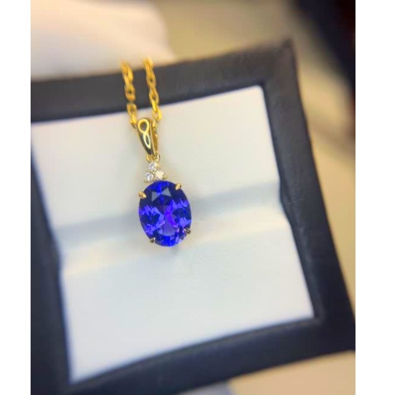 Oval Tanzanite & Diamond Pendant - Yellow Gold