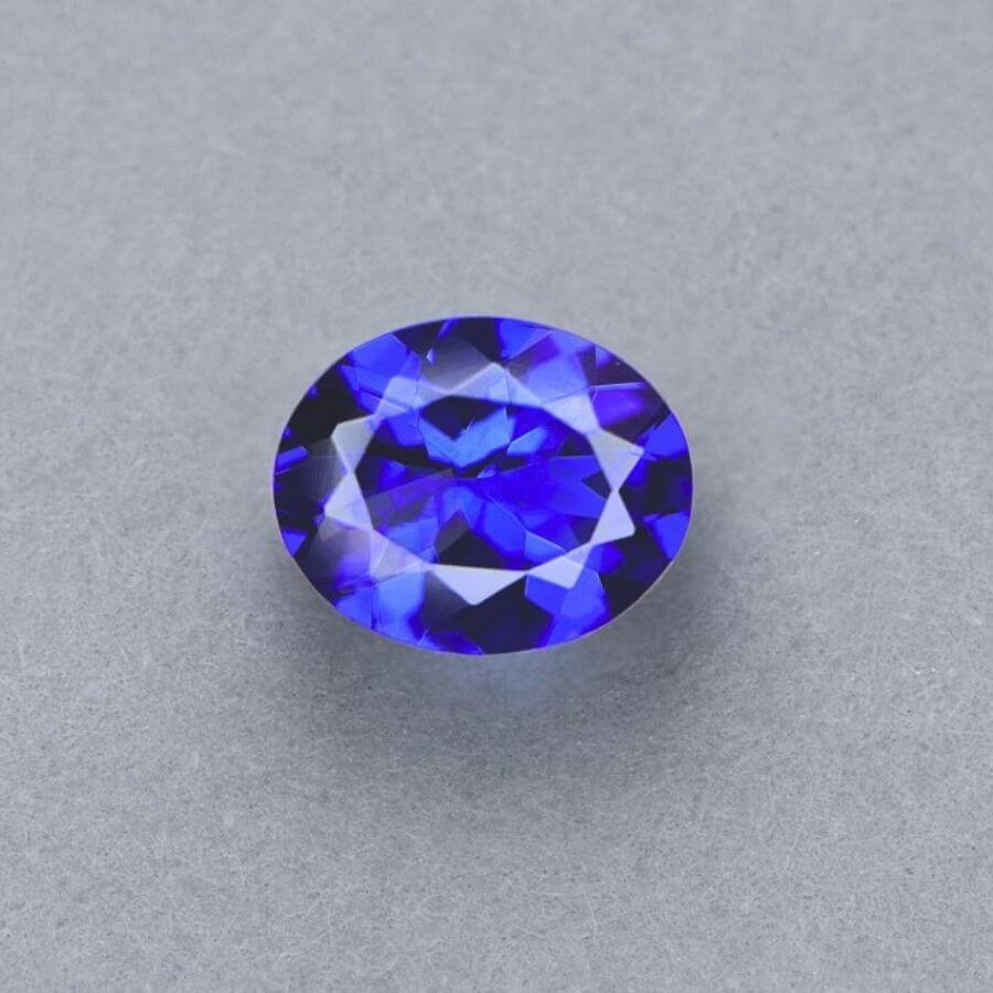 Emerald-cut tanzanite gemstone with vivid royal blue colour