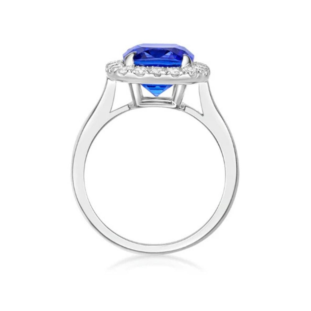 2.00 Ct Emerald Cut Tanzanite & Diamond Halo Ring