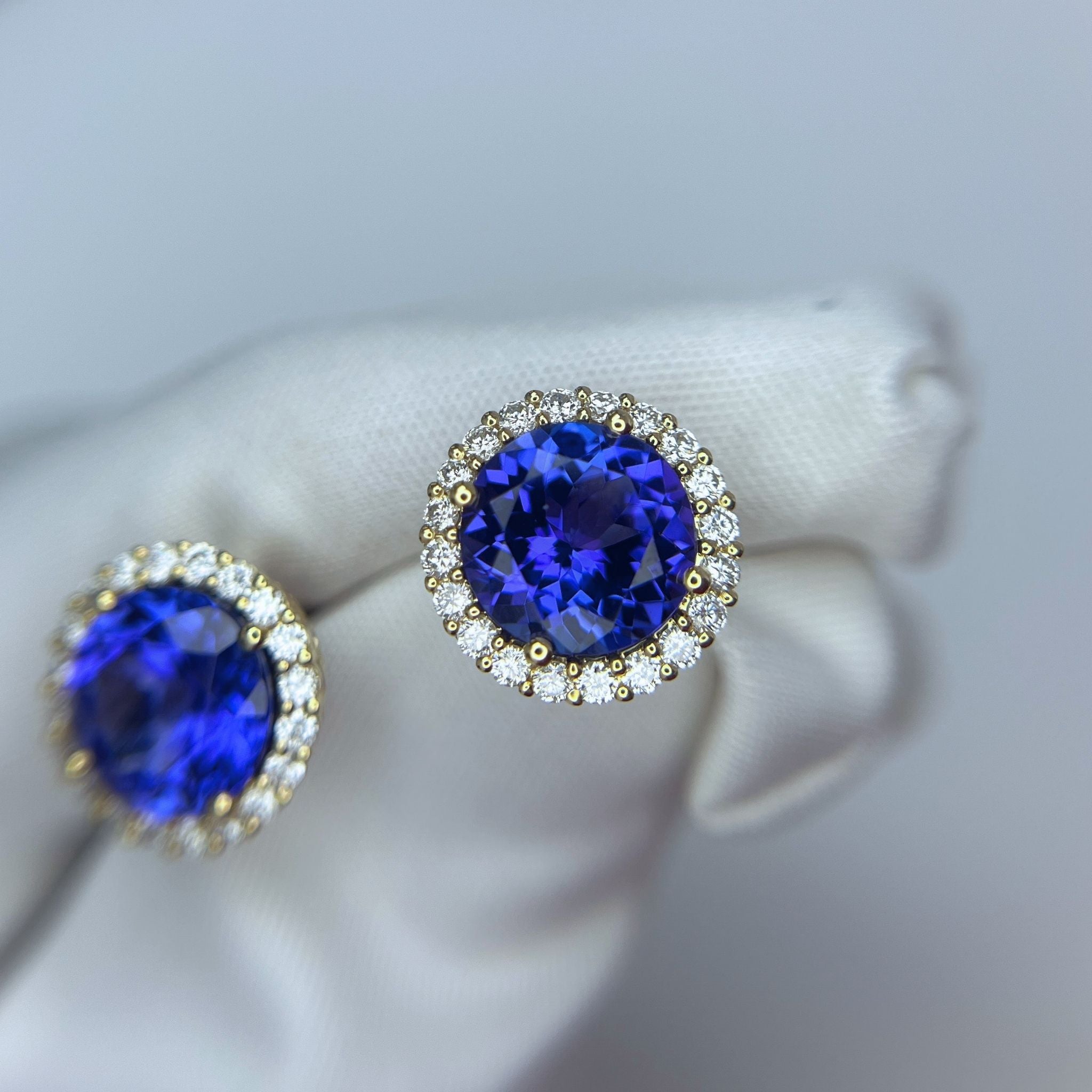 Exceptional Tanzanite and Diamond Halo Stud Earrings – 18ct Yellow Gold