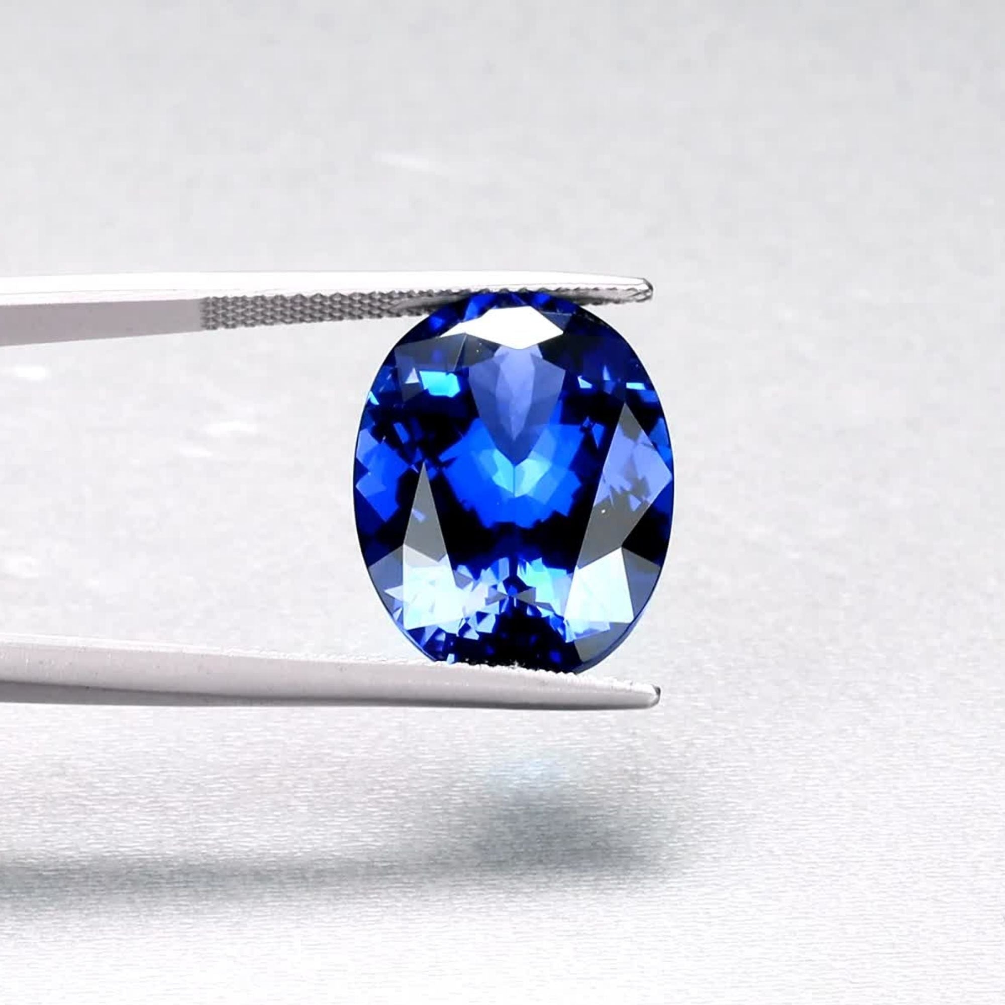 Emerald-cut tanzanite gemstone with vivid royal blue colour