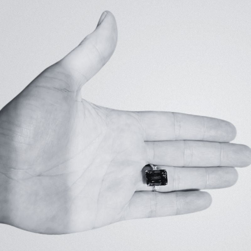 Emerald Cut Tanzanite Ring with Princess Cut  Diamonds