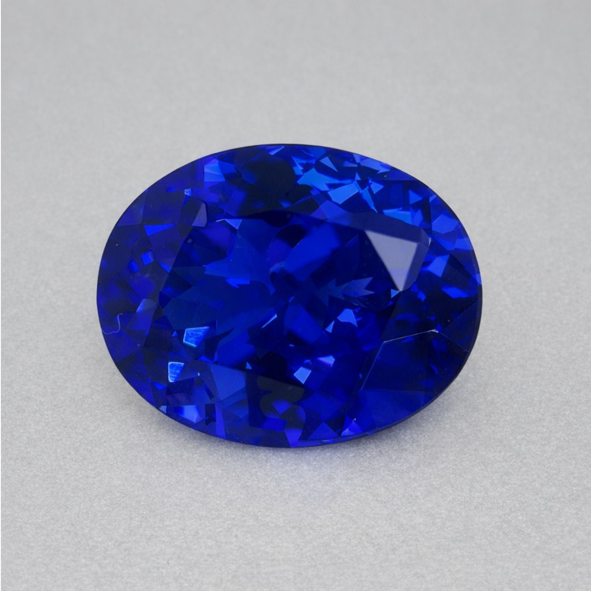 Emerald-cut tanzanite gemstone with vivid royal blue colour