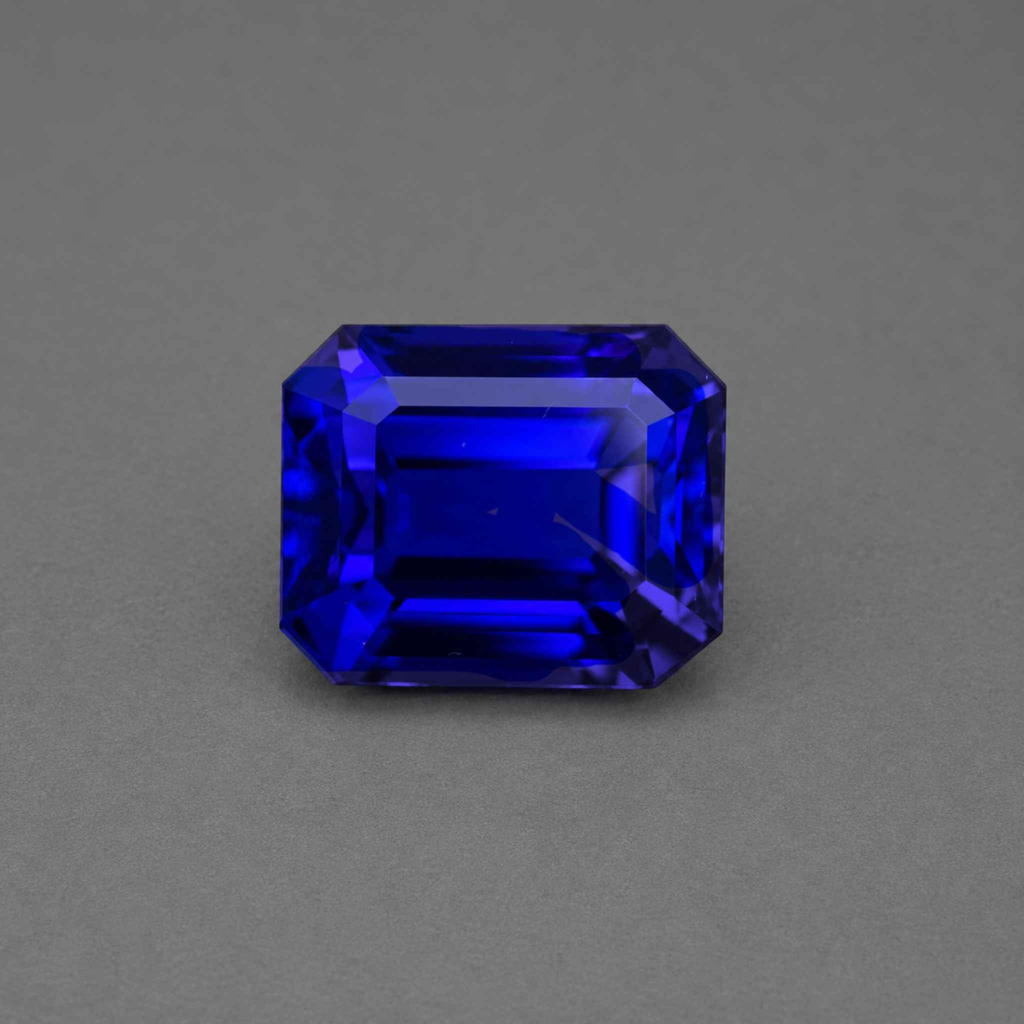 Emerald-cut tanzanite gemstone with vivid royal blue colour