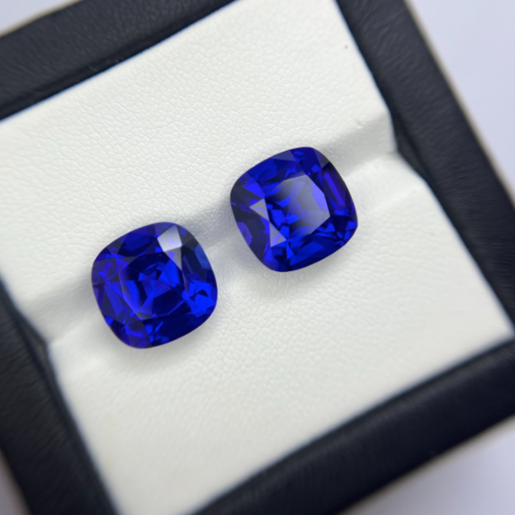 Exceptional Pair of Tanzanite Cushion Cuts - Matching Set- 15 carats