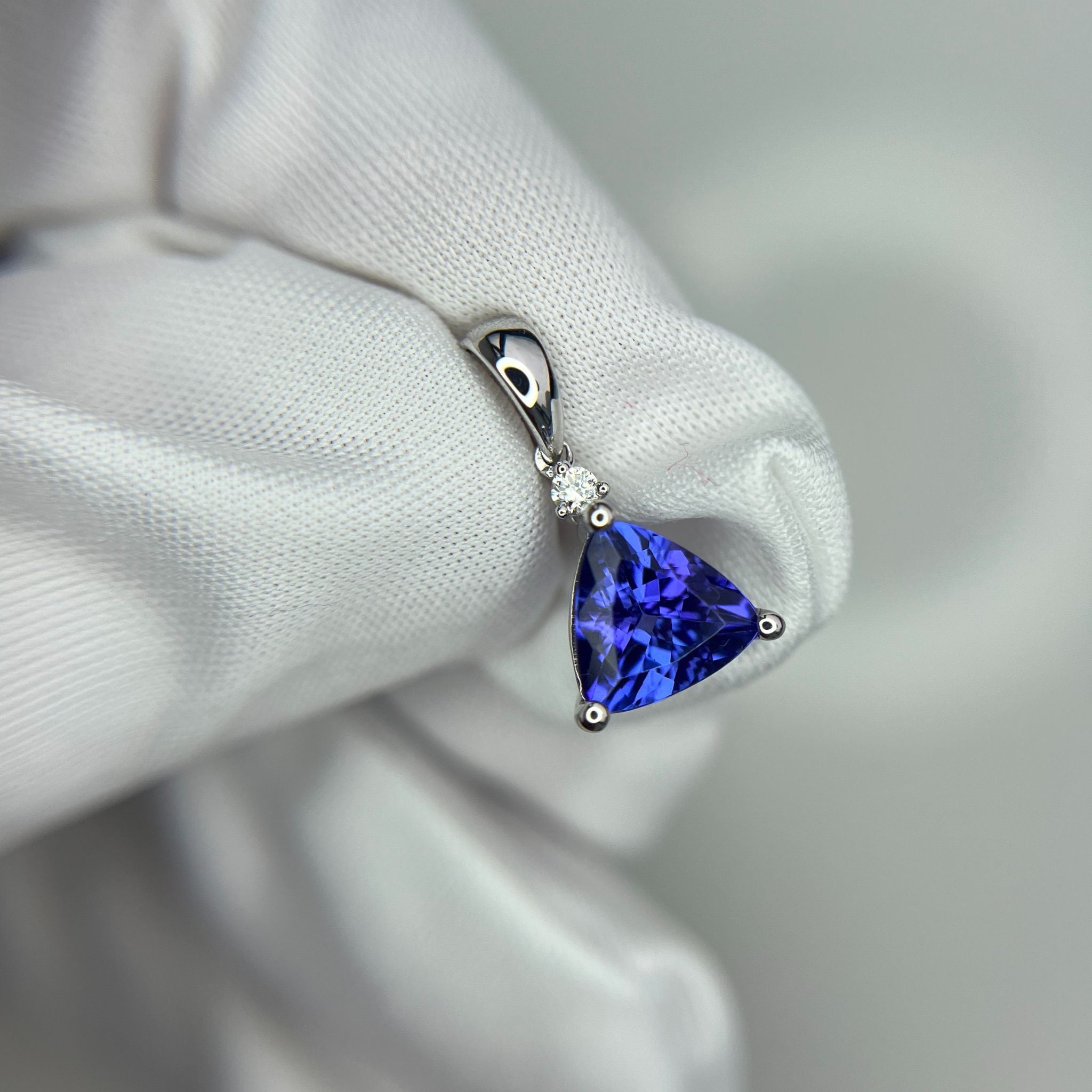 Trillion Cut Tanzanite & Diamond Pendant in White Gold