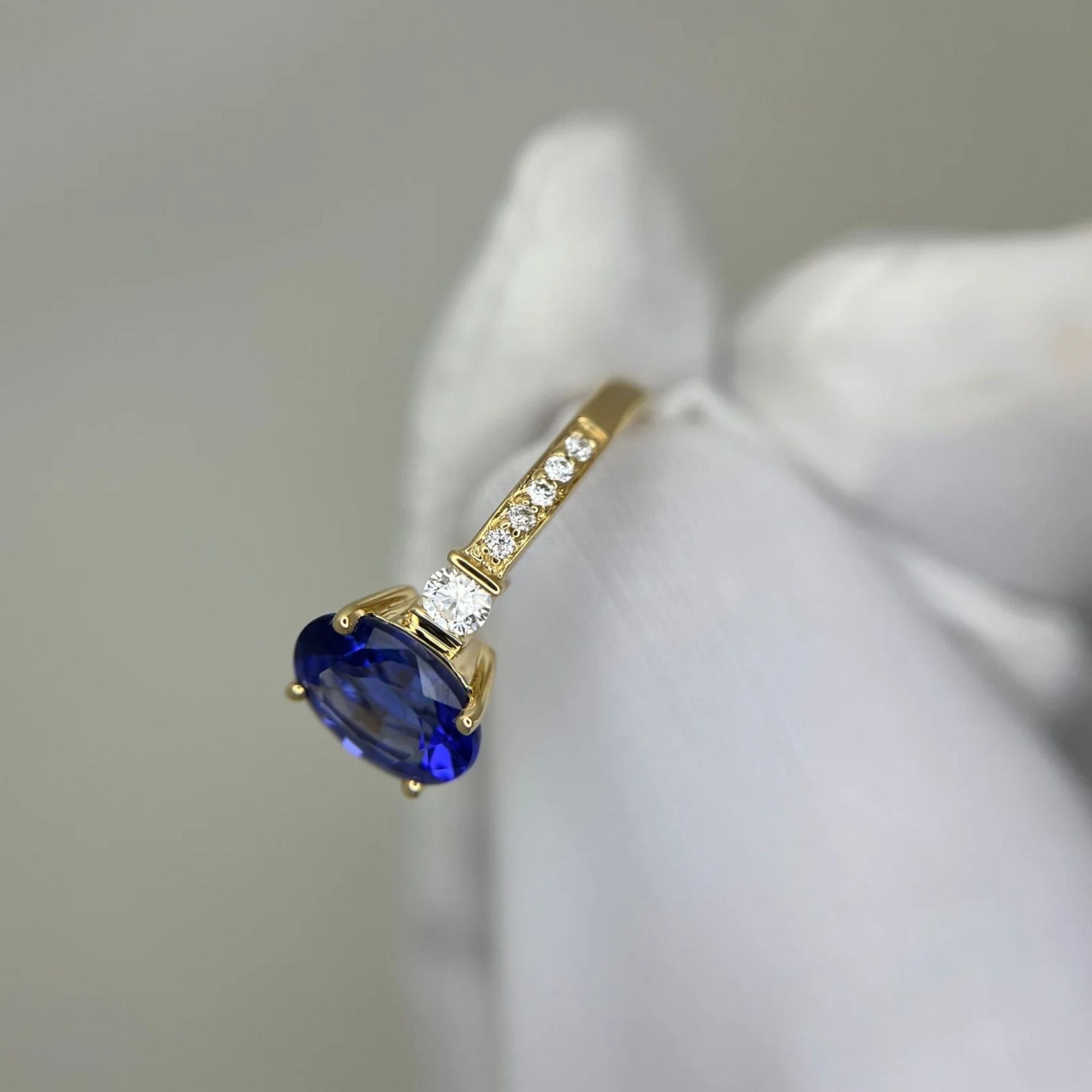 “Evening Sky” Oval Tanzanite & Diamond Ring - Yellow Gold