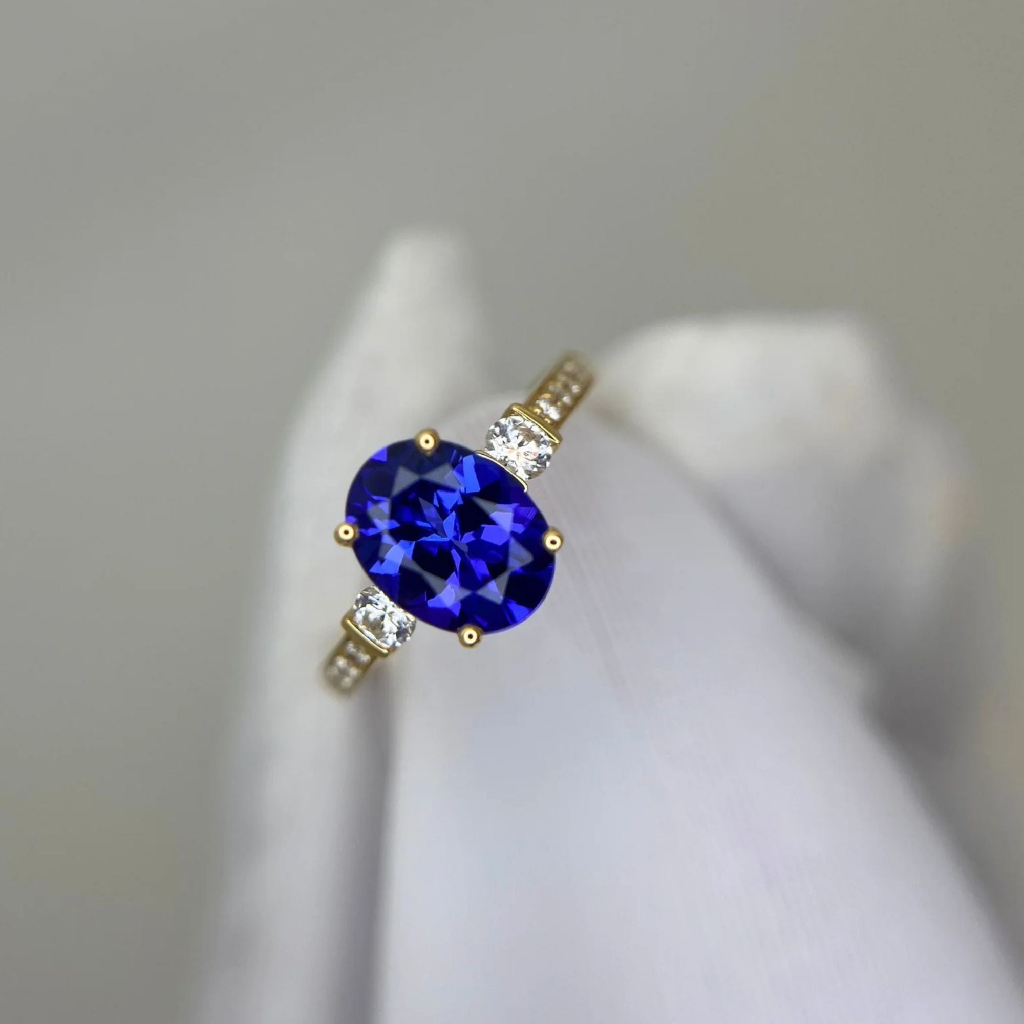 “Evening Sky” Oval Tanzanite & Diamond Ring - Yellow Gold