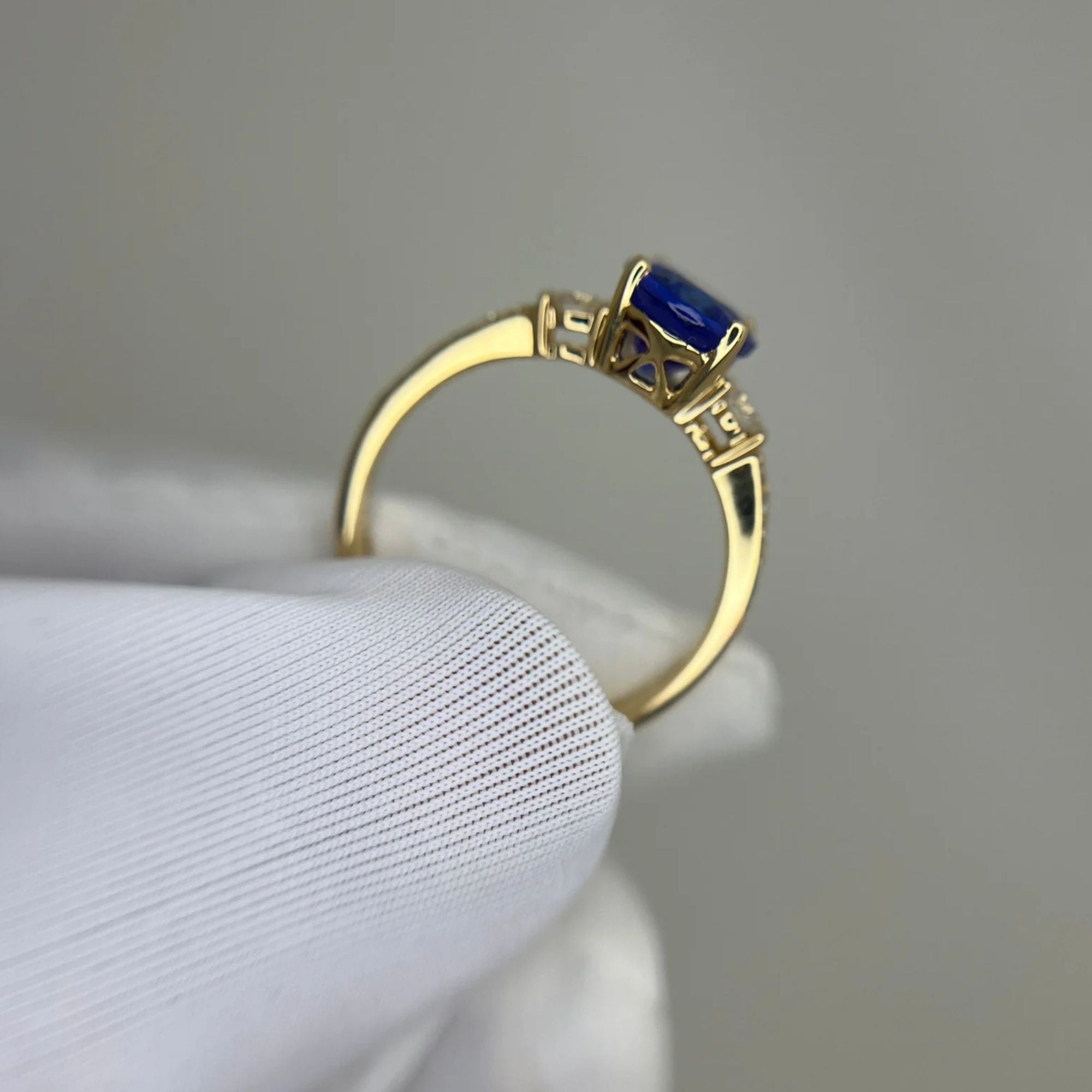 “Evening Sky” Oval Tanzanite & Diamond Ring - Yellow Gold