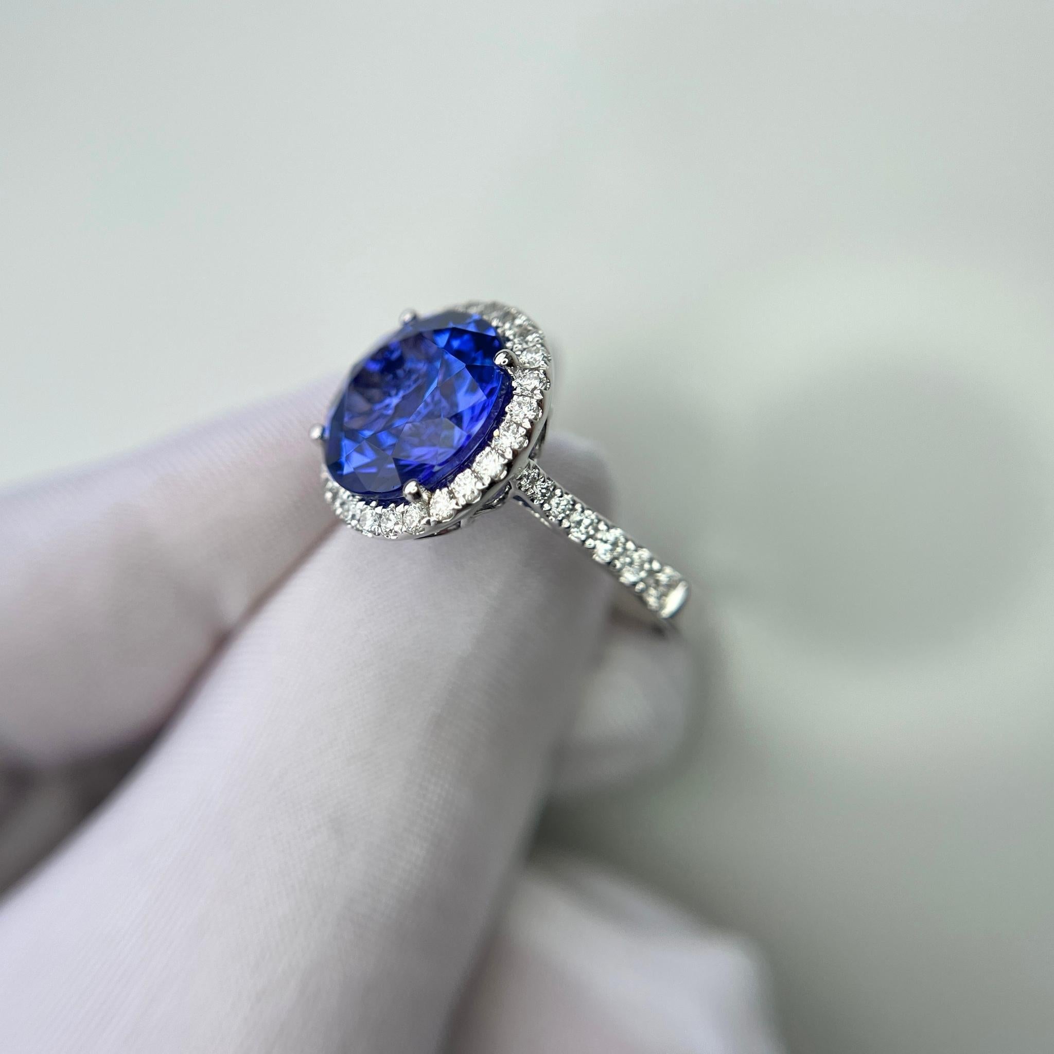 6.5 Carat Exceptional Round Tanzanite & Diamond Halo Ring