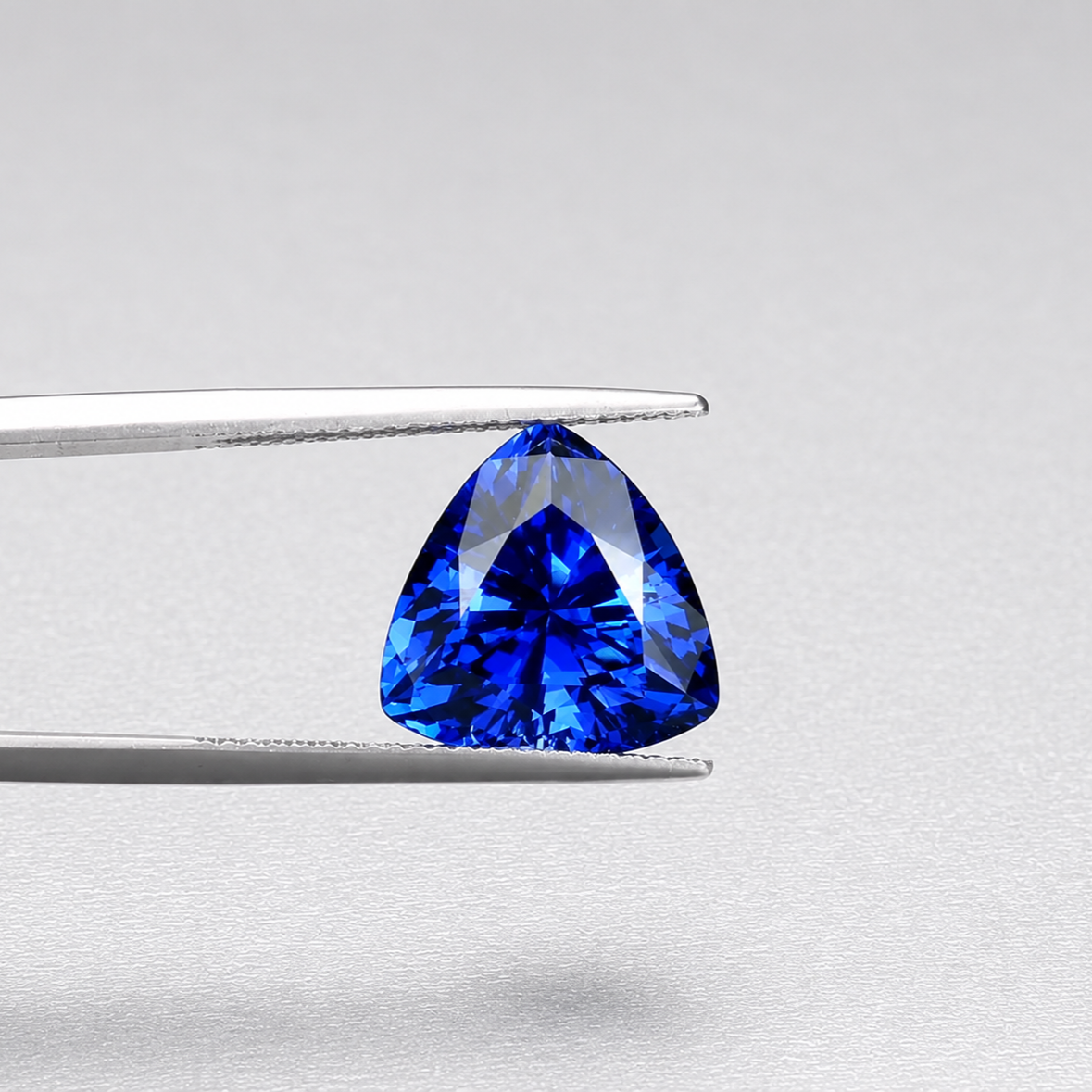 Emerald-cut tanzanite gemstone with vivid royal blue colour