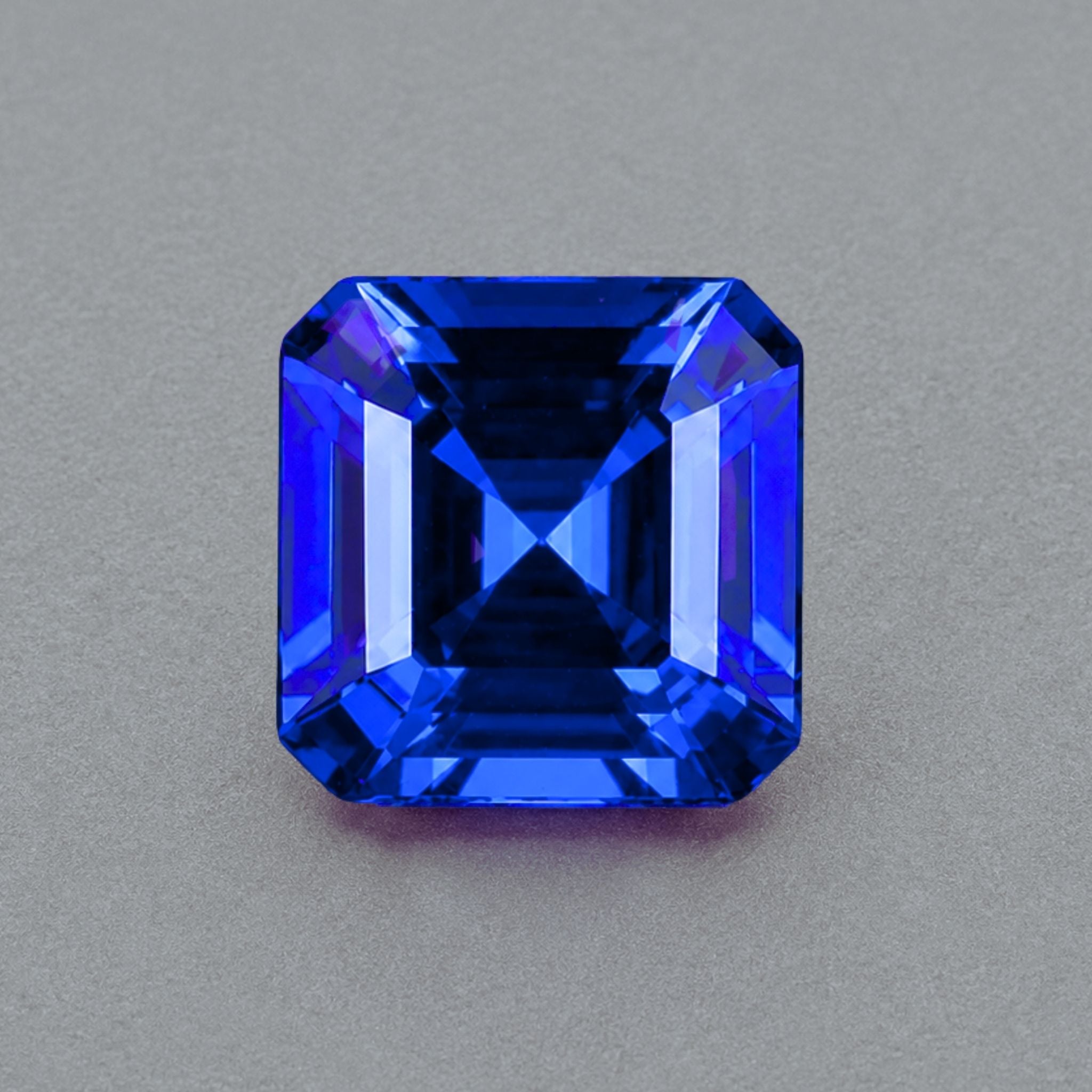 Emerald-cut tanzanite gemstone with vivid royal blue colour