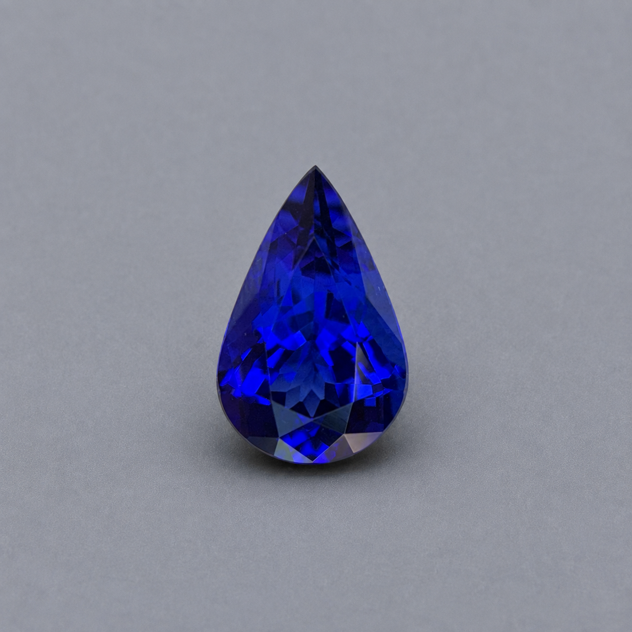 Emerald-cut tanzanite gemstone with vivid royal blue colour