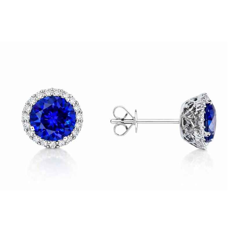 Pair of blue tanzanite vb 6/6 gemstone earrings on a white background