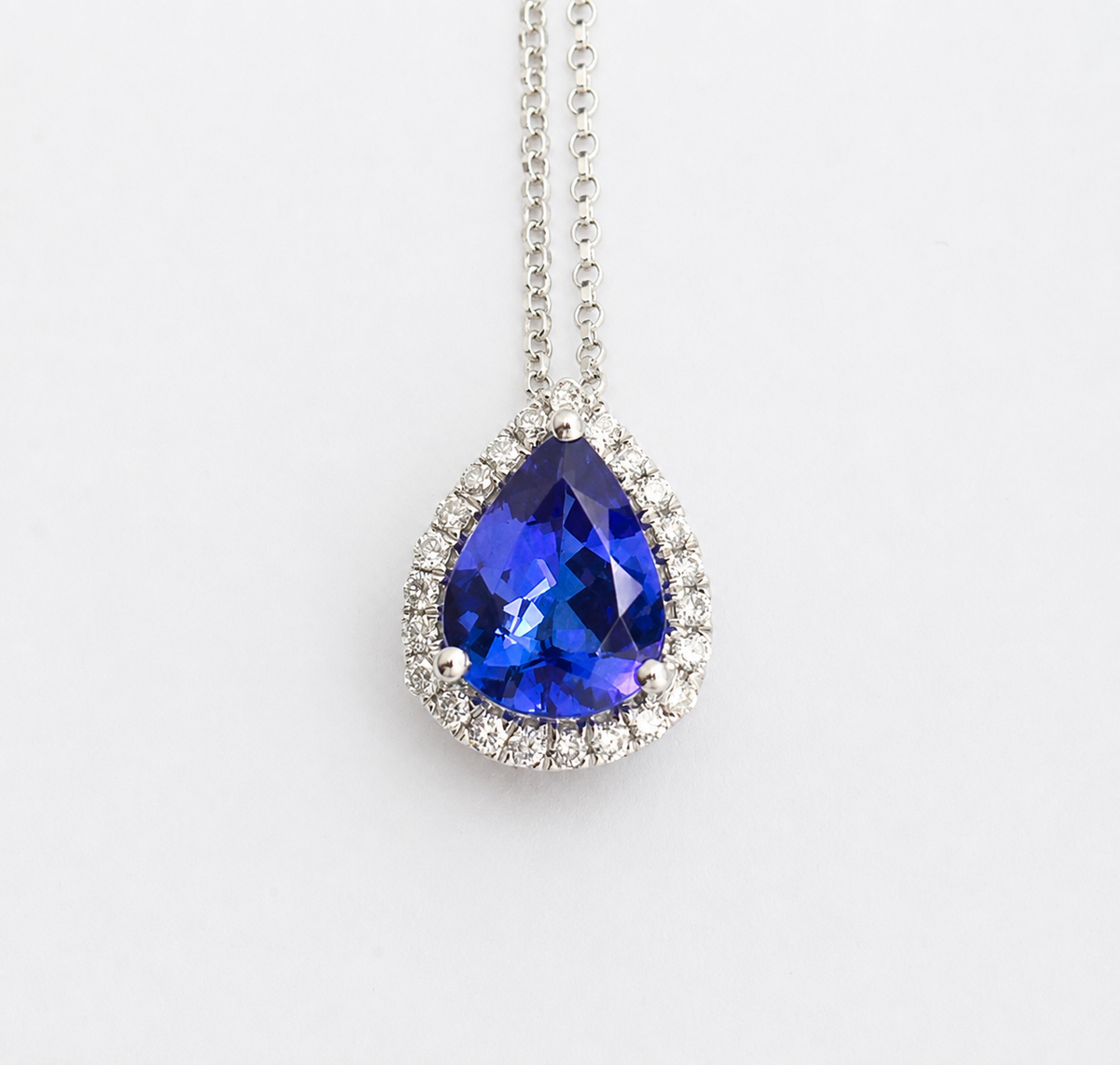 Pear-Shaped Tanzanite Pendant With Diamond Halo