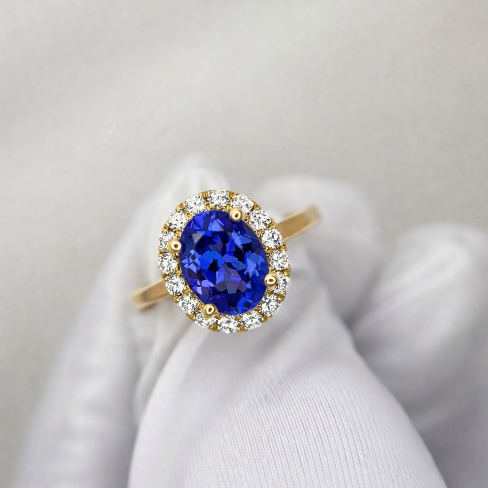 ”Kate” 2.00 Ct Oval Tanzanite & Diamond Halo Ring in Yellow Gold