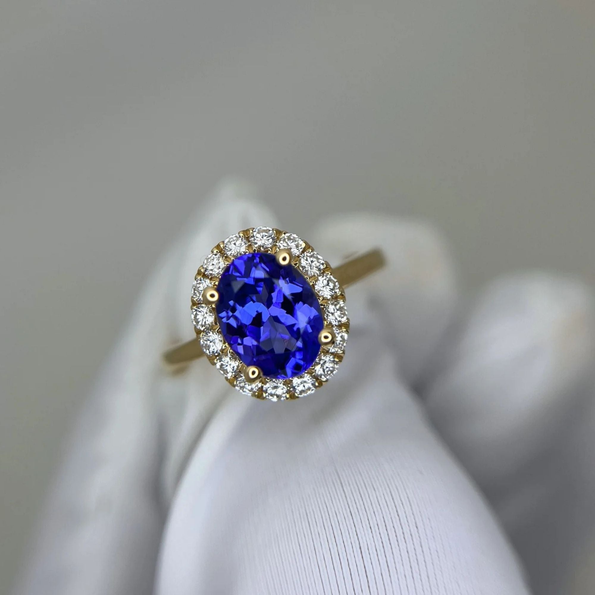 ”Kate” 2.00 Ct Oval Tanzanite & Diamond Halo Ring in Yellow Gold