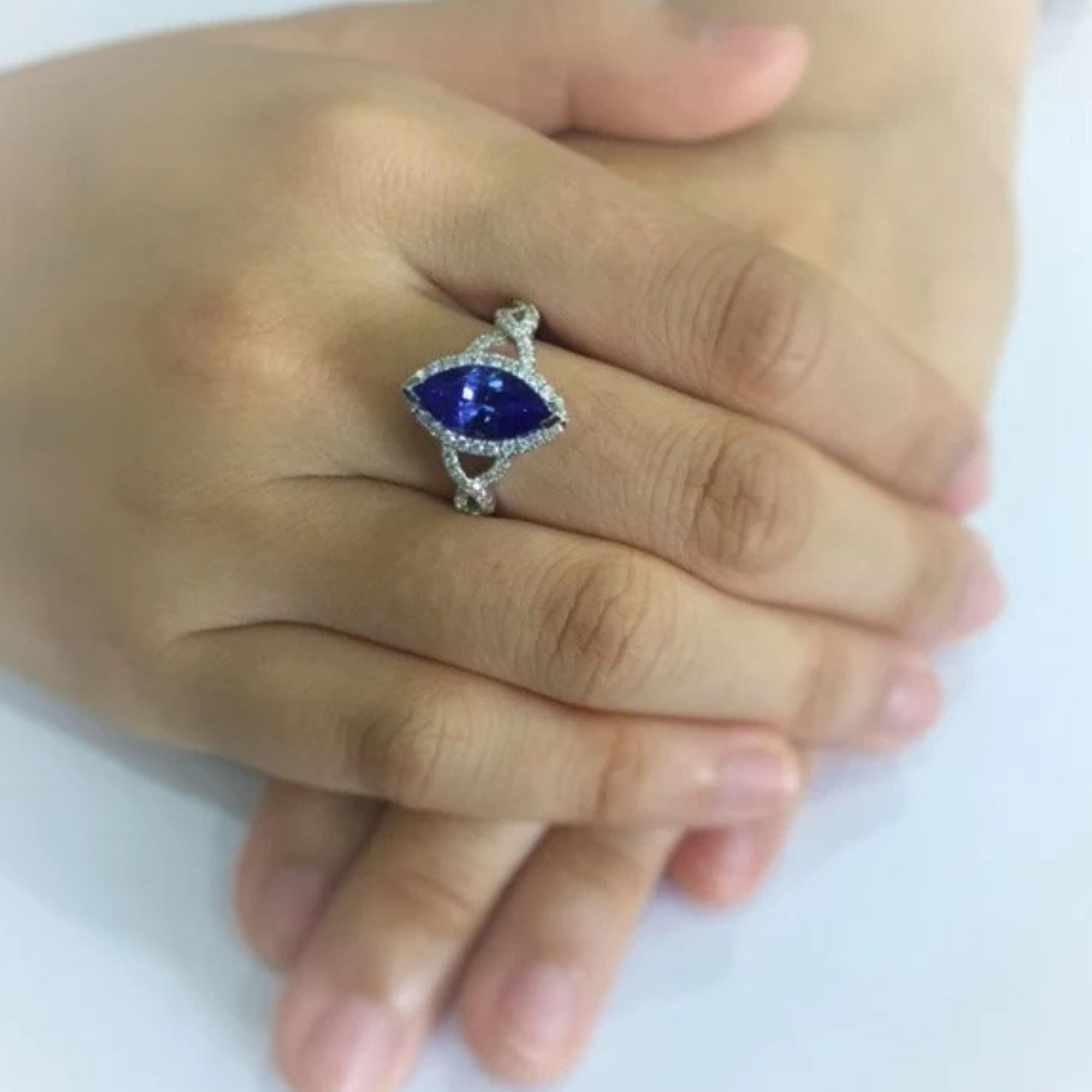 2.00 Ct Marquise Cut Tanzanite Twist Ring with Diamond Halo & Band