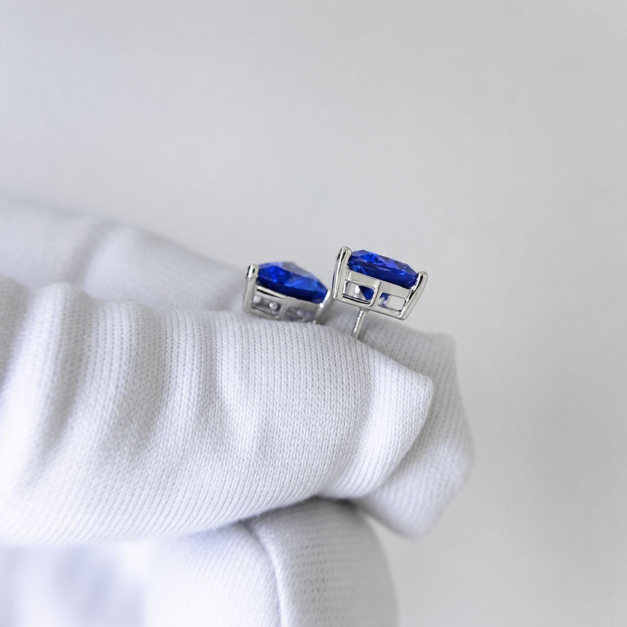 Premium Trillion Cut Tanzanite Stud Earrings in 18k White Gold