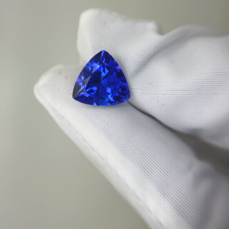 Emerald-cut tanzanite gemstone with vivid royal blue colour