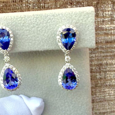 per shaped double drop articulated dangle earrings 

