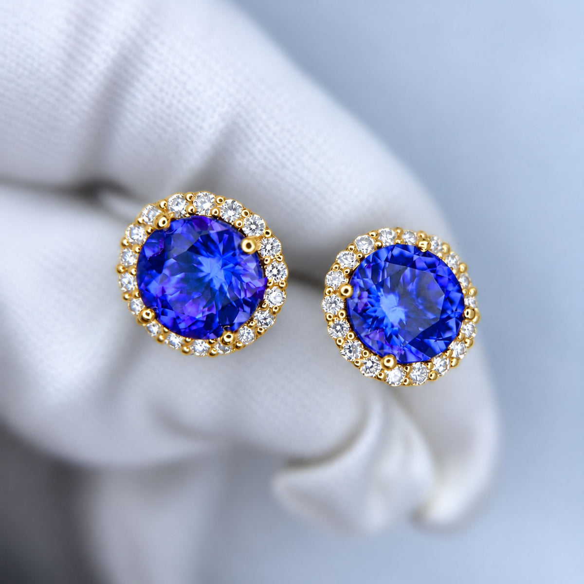 Exceptional Five Carat Tanzanite and Diamond Halo Stud Earrings – 18ct Yellow Gold